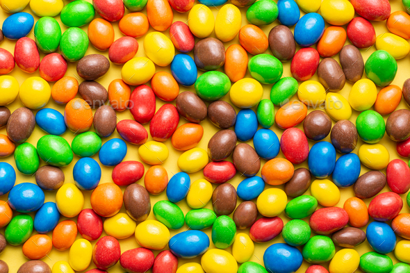 colored crunchy chocolate balls occupying the entire image Stock Photo